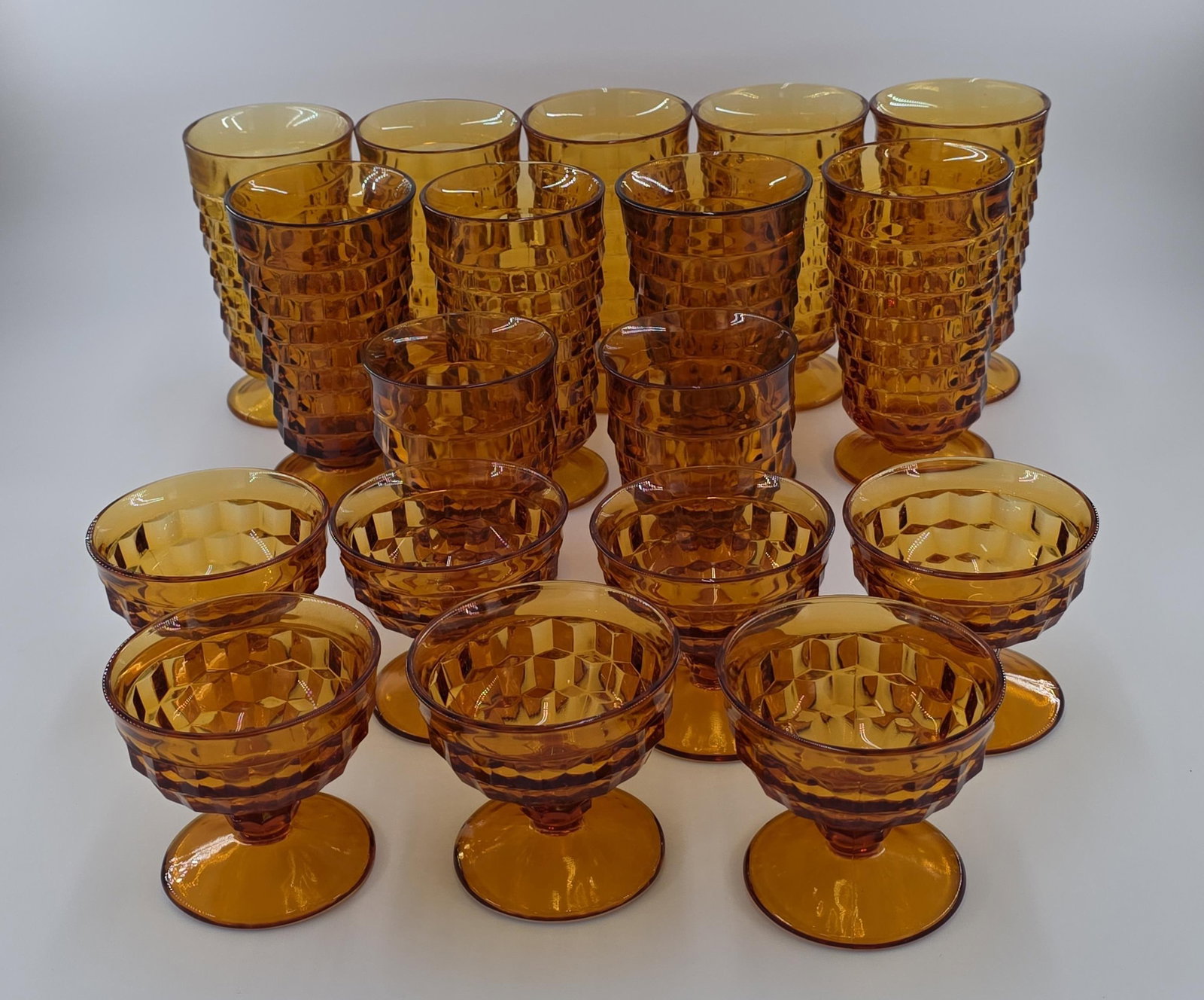 Amber Colony Cubist Glassware Set, 25 pieces, Vintage, INV. 1113: Iced tea glasses approx. 6" height, footed tumbler 4 3/8" height. 8 sherberts in total (1 missing from photos).