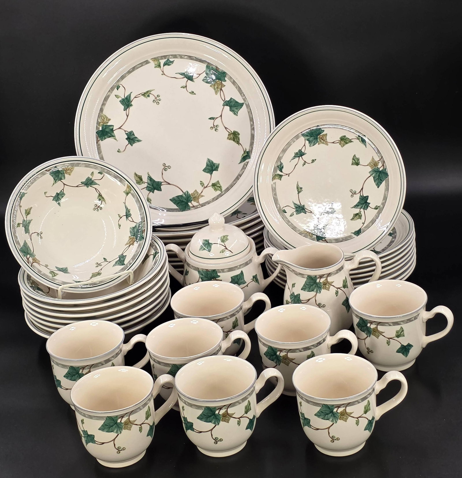 Keltcraft by Noritake Set, 36 Pieces, INV. 1054: 10 1/2" dia. of largest plate. Approx. 3" height of mug. With some chips.