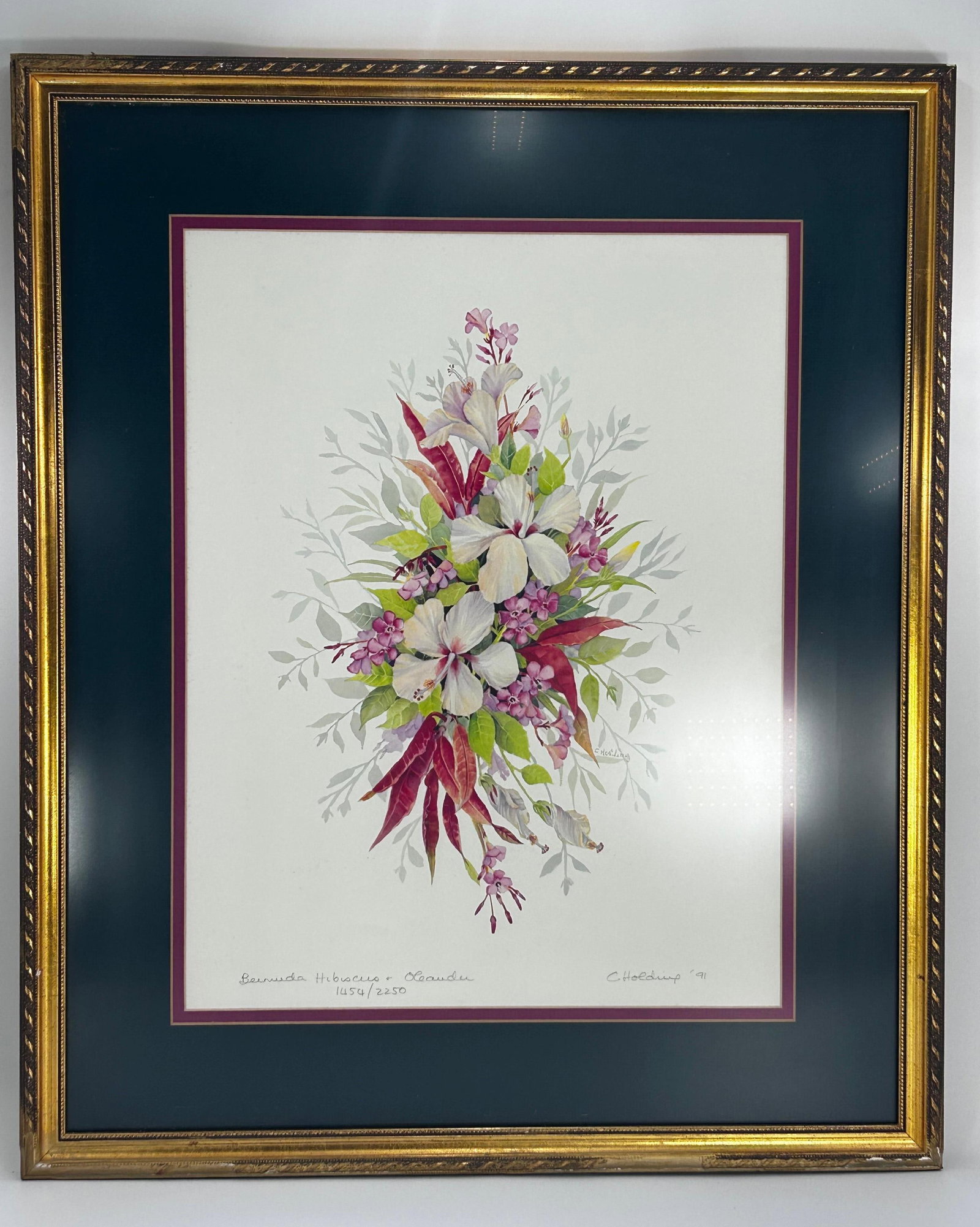 Carole Holding "Bermuda Hibiscus & Oleander", Signed print: Titled and editioned to lower left. Signed and dated to lower right. Frame approx. 24.625 x 20.625 x 0.875 inches