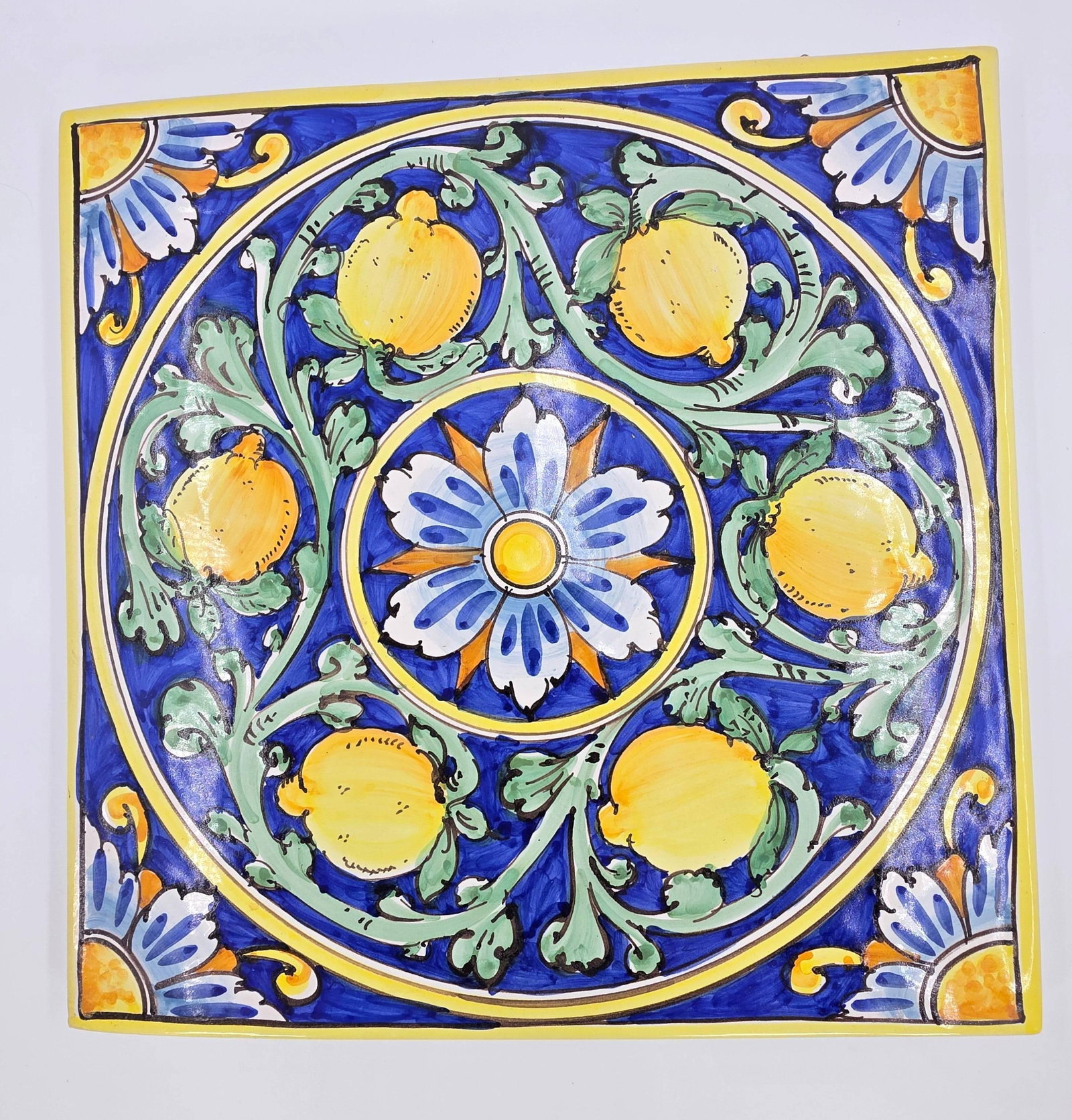 Italian Ceramic Tile or Wall Plate, Lemon, Floral and Royal Blue, INV. 268: Lemon and floral motifs, with royal blue. Pippo Torcivia inscription to back. Approx.?15.25 x 15.25 x 0.75 inches