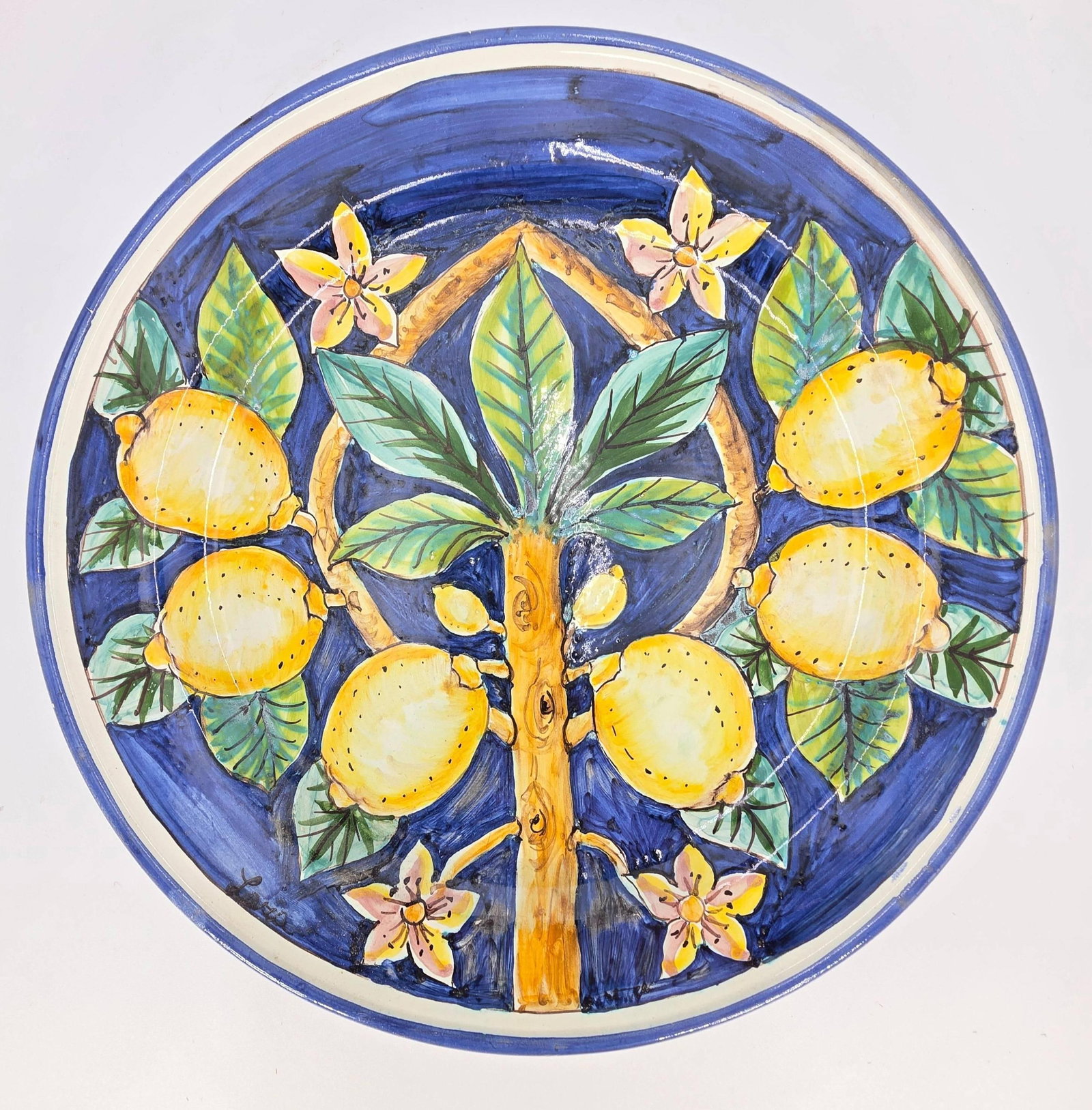 Italian Ceramic Tile or Wall Plate, Lemon Tree and Floral, INV. 267: Lemon tree and floral motif, cobalt blue. Approx. diameter 11.75 inches