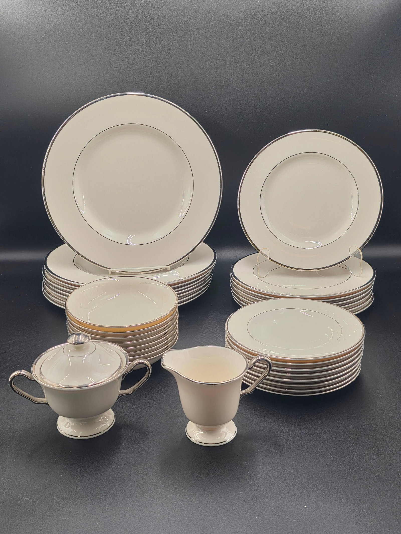 Del-Crest Eternity Set with 8 Lenox Lenox Bowls, INV. 2026: Includes 8 plates, 7 small plates, 8 bread plates, 8 bowls, 8 cups, 8 saucers, 1 creamer, 1 sugar bowl, 2 serving platters, and 2 serving bowls. Seving platter 9.5 x 12.5 inches.