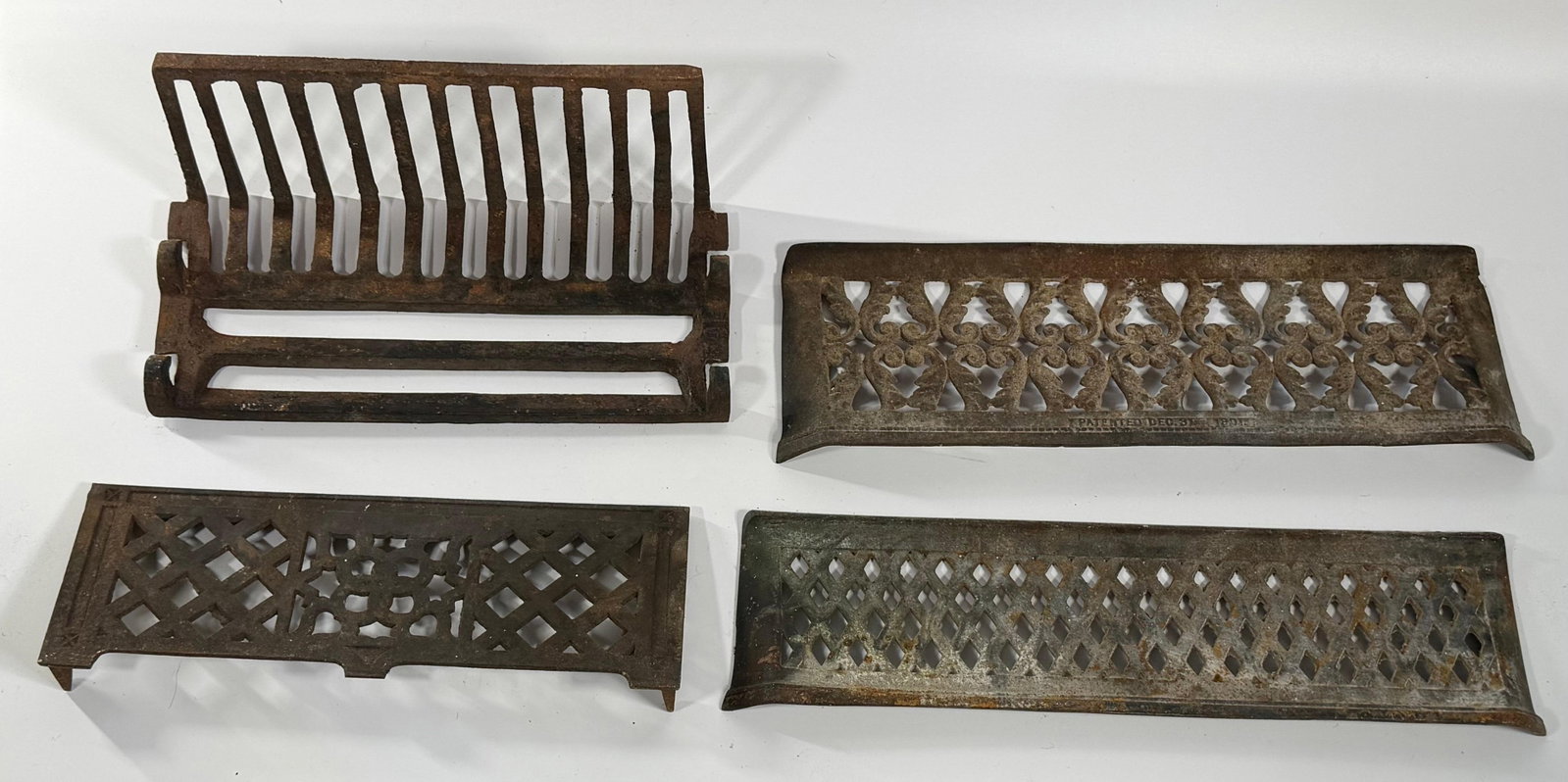 Group of 4 Antique Cast Iron and Wrought Iron Fireplace Fenders, INV. 855, 856, 857, 858: Largest approx. 6.5 x 16 x 8 inches