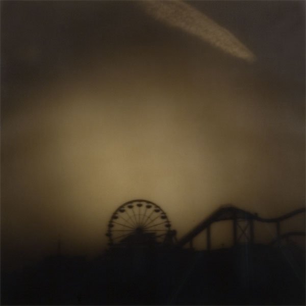 Jack Spencer: Carnival Cloud, Santa Monica, CA, 2000, toned silver print with oleopasto, signed verso, ed. 19/40, framed, 12.25"x17.625" (Courtesy Hope and Michael Proper).