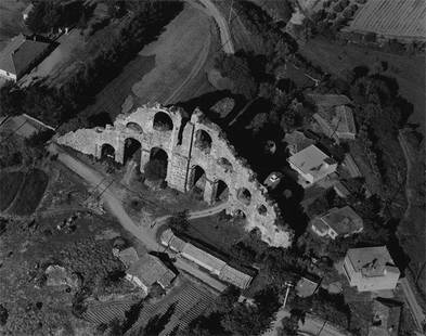 Marilyn Bridges: Ancient Aqueduct and Village, Aspendos, 2004, silver print, signed & titled verso, 20"x24".