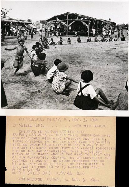 W. Eugene Smith: Name: W. Eugene Smith Title: Children on Saipan see new life Date: 1944 Process: silver print Size: 7"x8.25"