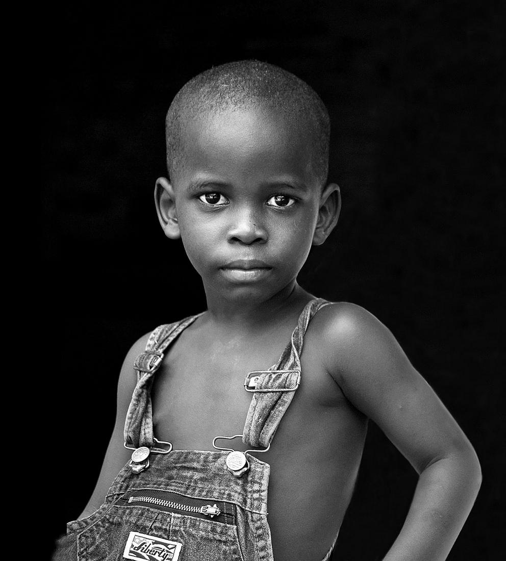 Sandra Chen Weinstein: The Boy from Congo: Sandra Chen Weinstein: The Boy from Congo, 2015, archival pigment print, #1/10, signed recto, Image size: 12"x11"; Sheet Size: 13"x19". Black and White exhibition and book, Andrew Smith Gallery, and S