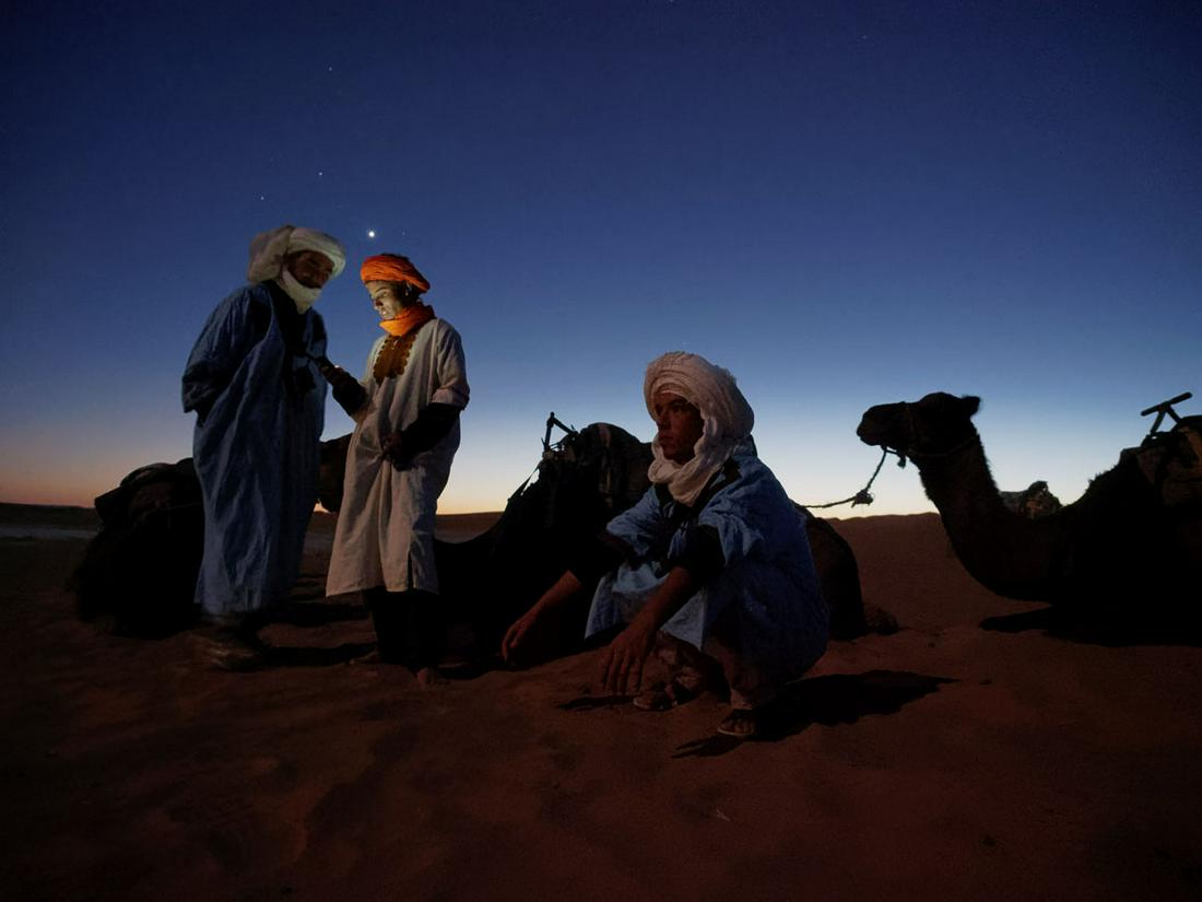 David H. Wells: Camel Drivers at Sunset, Morocco (1 of 1)