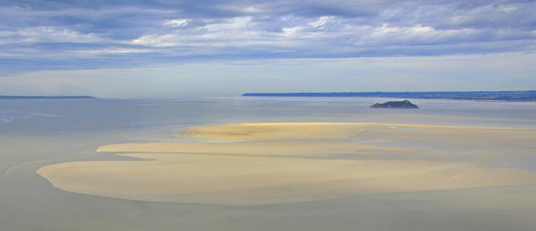 Walter Holt: Tidal Movement (as seen from Mont: Walter Holt: Tidal Movement (as seen from Mont Saint-Michel, France), 2014, archival pigment print, signed verso, Image size: 18.5"x8"; Sheet Size: 13"x19" .