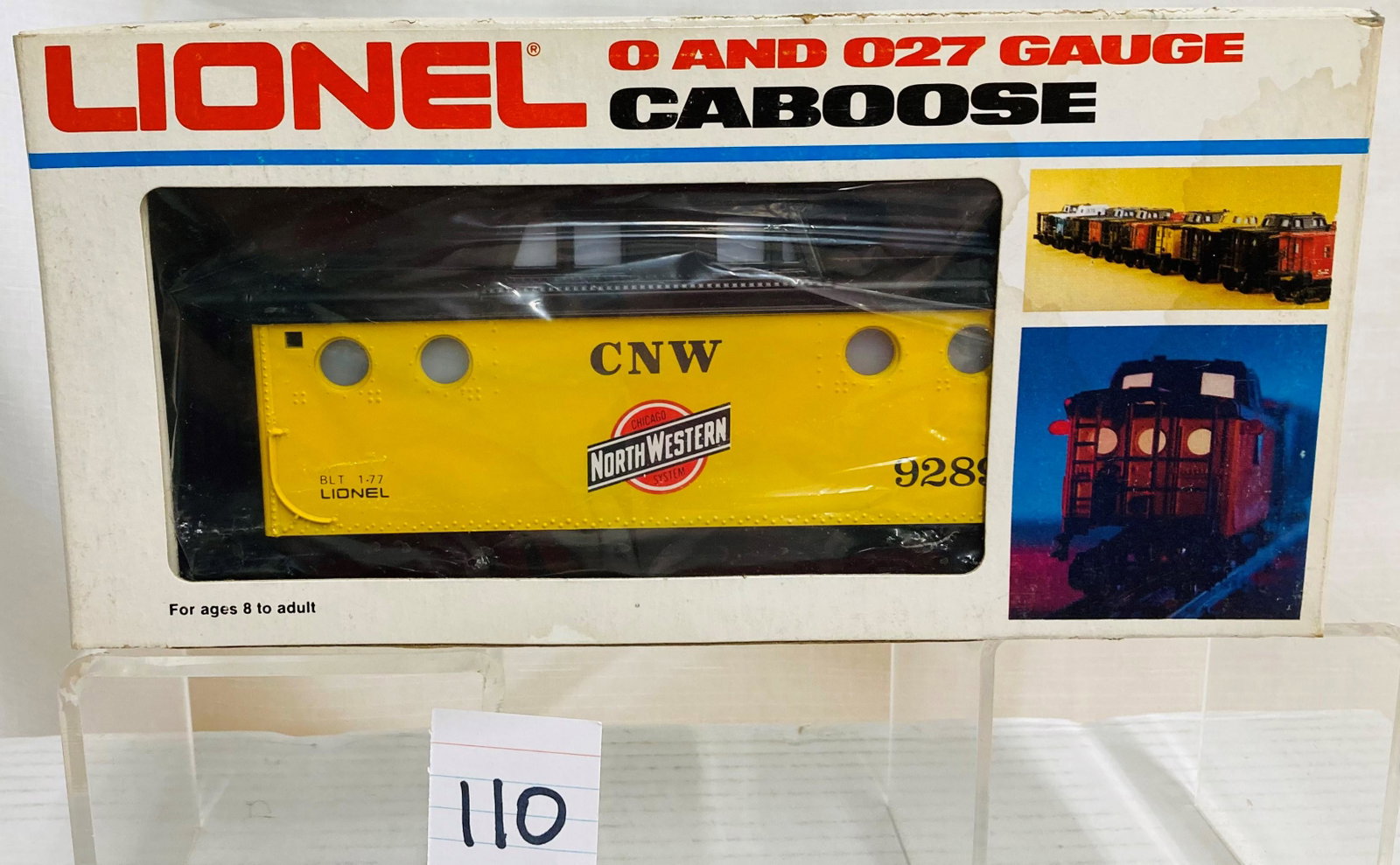 Lionel 9289 C&NW Porthole Caboose with Original Box: Lionel 9289 C&NW Porthole Caboose with Original Box, C9. Box has some stains.