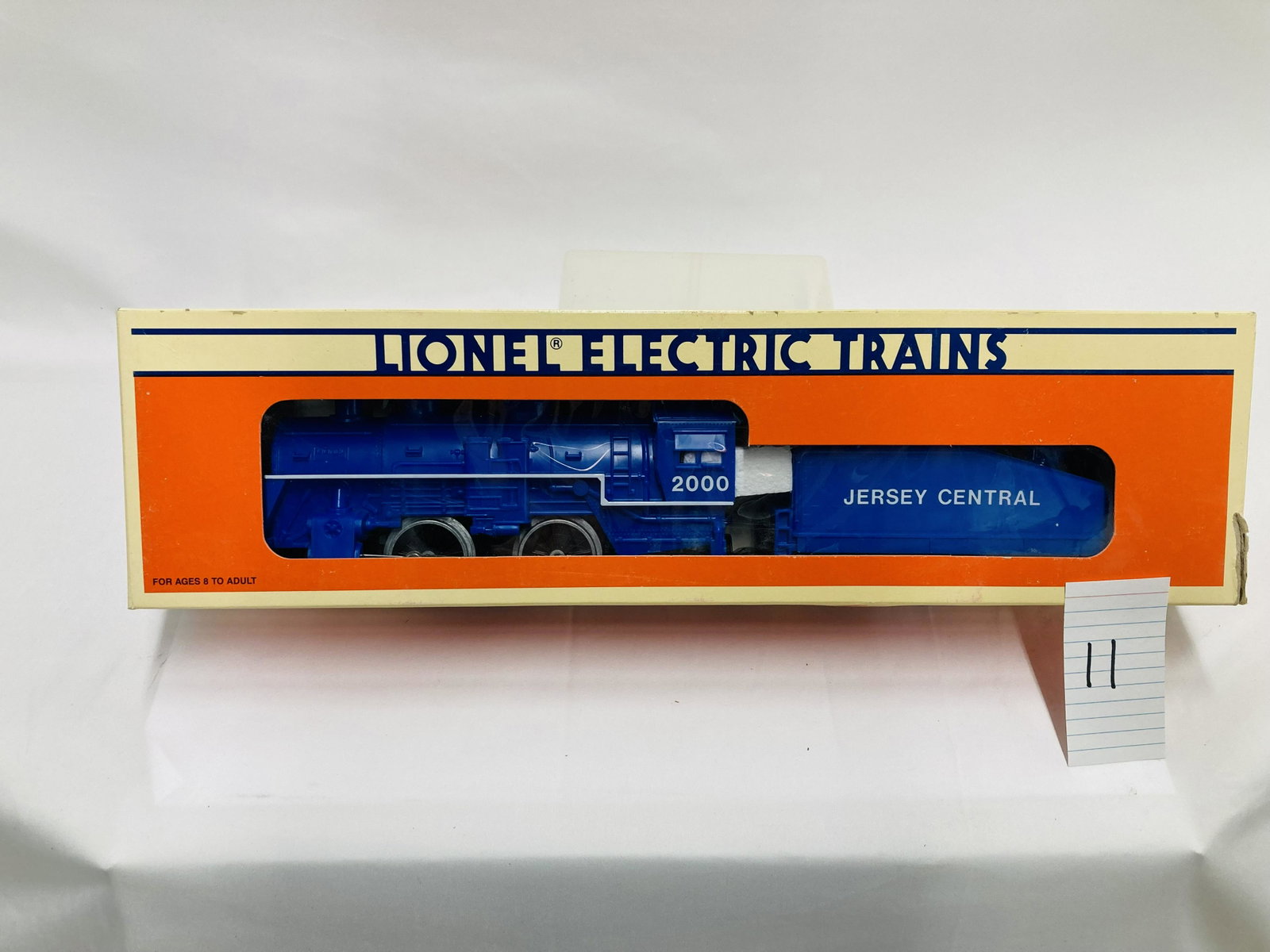 Lionel 18712 Blue Jersey Central Steam Locomotive and Tender w/ OB: Lionel 18712 Blue Jersey Central Steam Locomotive and Tender w/ OB, C10 (tear on one end flap), C10