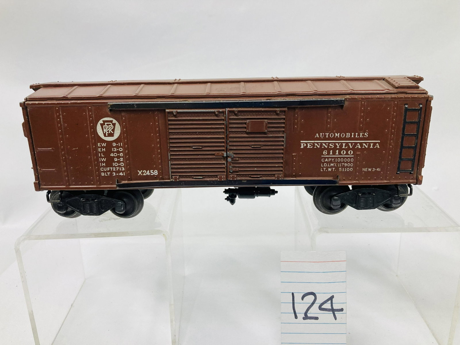 Lionel Early Postwar 2458 Penn Automobile Boxcar w/ Flying Shoe Trucks: Lionel Early Postwar 2458 Penn Automobile Boxcar w/ Flying Shoe Trucks, C7+. Car needs a light cleaning.