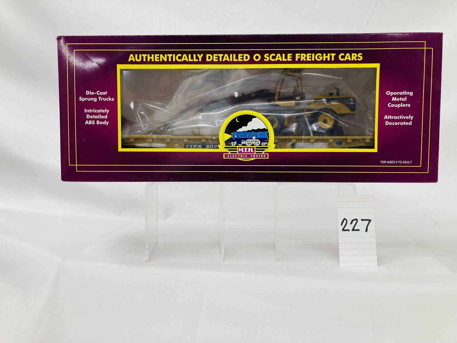 MTH 20-98448 TTX Flat Car w/ Caterpillar Harvester with HH65 Cutting Head & OB: MTH 20-98448 TTX Flat Car w/ Caterpillar Harvester with HH65 Cutting Head & OB, C10