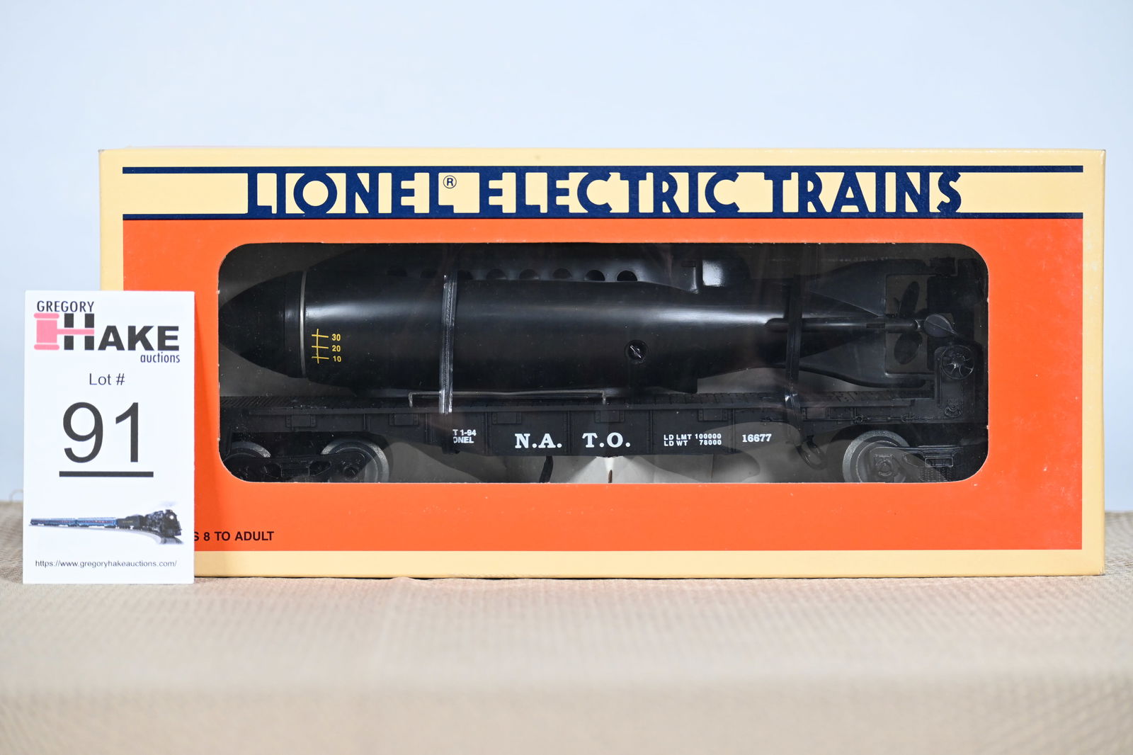 Lionel (LTI) - 16677: (O Gauge) NATO - Flatcar with Royal Navy Submarine w/OB (1 of 2)