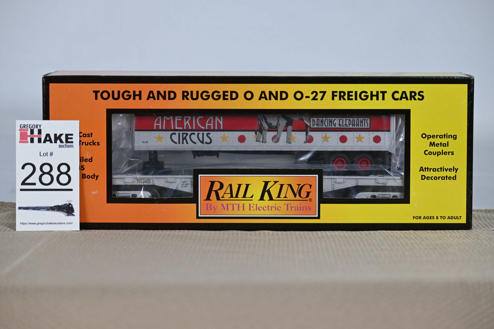 MTH (RailKing) - 30-76179: (O Gauge) Circus - Flat Car w/ Trailer w/OB (1 of 2)