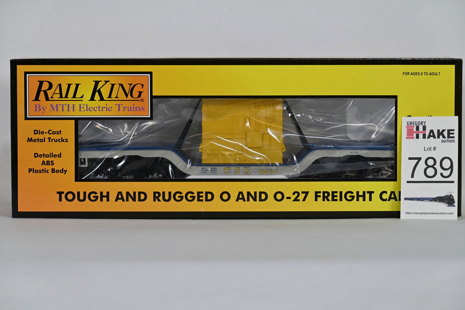 MTH (RailKing) - 30-76098: CSX - Dep. Center Flat Car w/Transformer Load - w/OB (1 of 2)