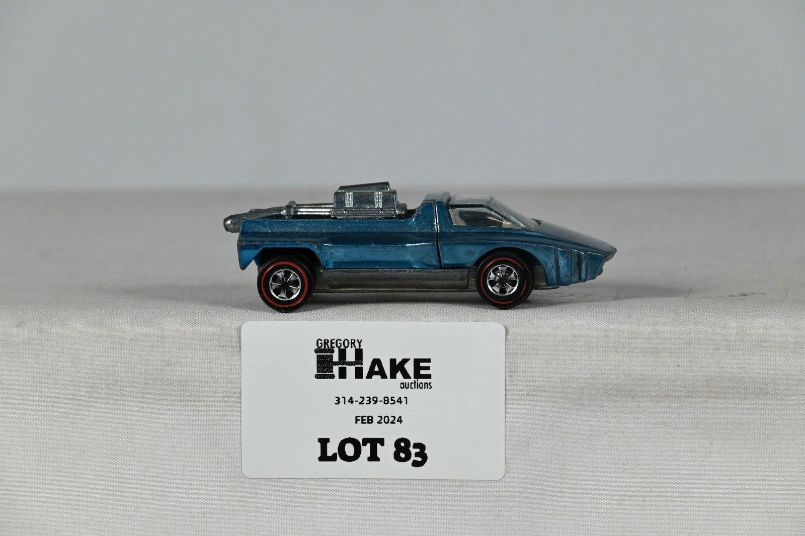 Hot Wheels Ice Blue Hairy Hauler: Hot Wheels Ice Blue Hairy Hauler, C6/7. Front wndshield has a crack.