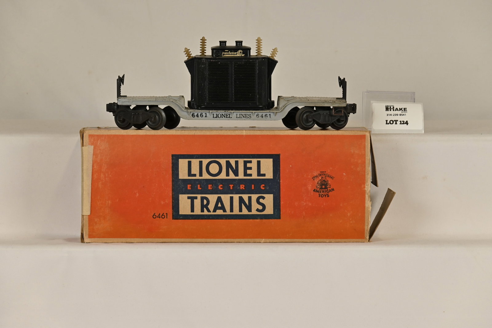 Lionel Postwar 6461 Depressed Center Transformer Car w/ OB: Lionel Postwar 6461 Depressed Center Transformer Car w/ OB. Car is C7 with Original Insulators. Box is mising an end flap