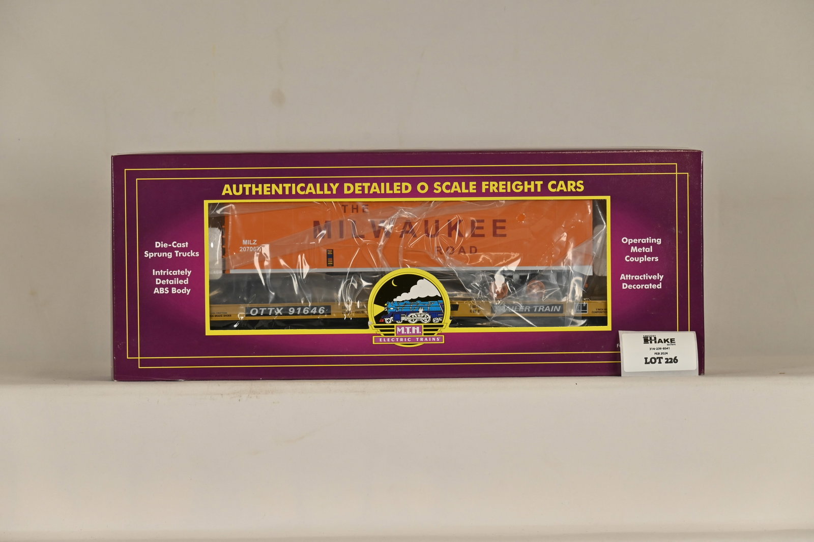 MTH 20-98129 Milwaukee Rd Flatcar w/ 40' Trailer: MTH 20-98129 Milwaukee Rd Flatcar w/ 40' Trailer, C10