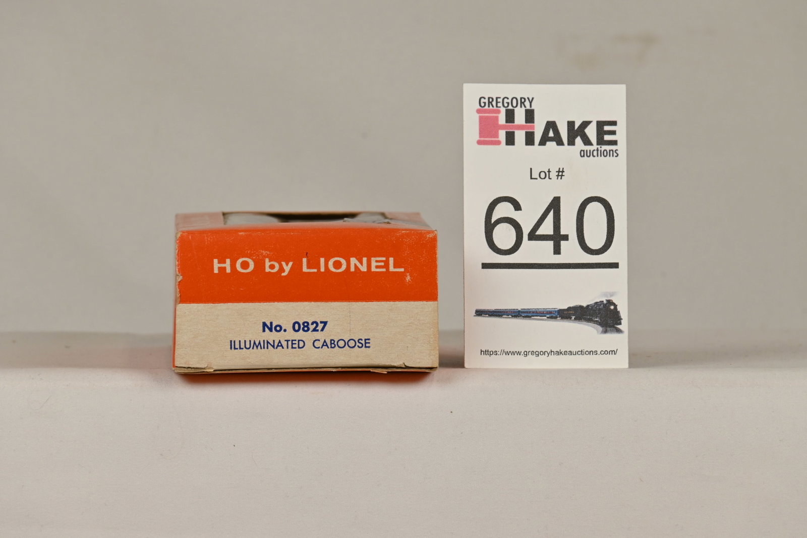 Lionel HO 0827 Illuminated caboose w/OB: Lionel HO 0827 Illuminated caboose w/OB, C8