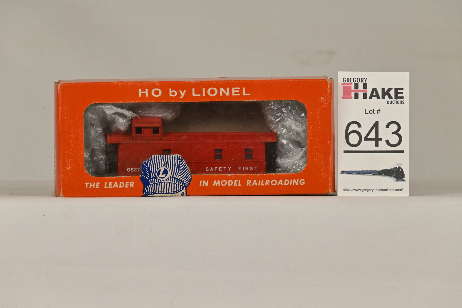 Lionel HO 0827 Illuminated caboose w/OB: Lionel HO 0827 Illuminated caboose w/OB, C6