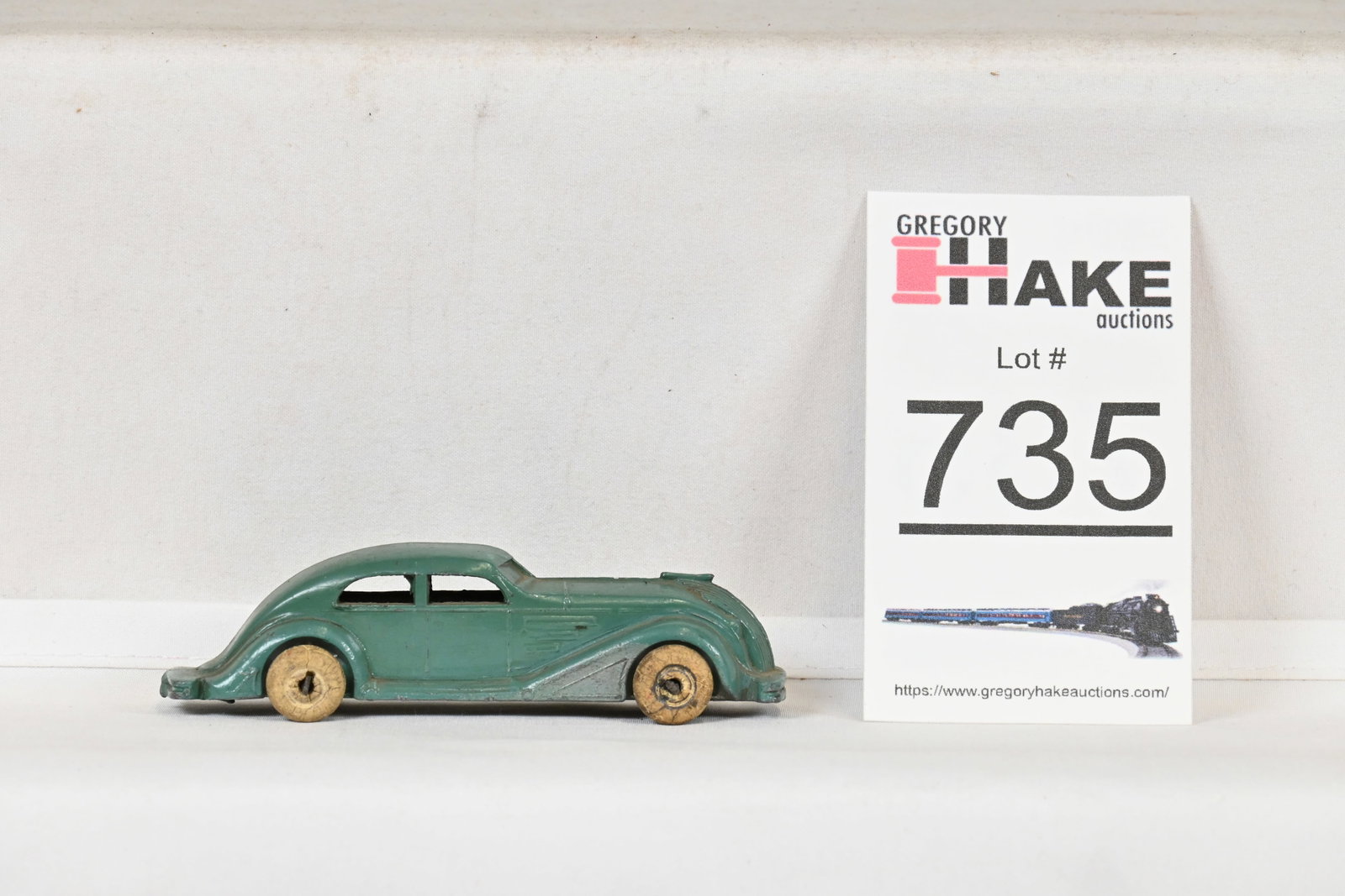Vintage Slush Lincoln White Metal Works Blue/Green Sedan: Vintage Lincoln White Metal Works Blue/Green Sedan, C7. About 4" long.