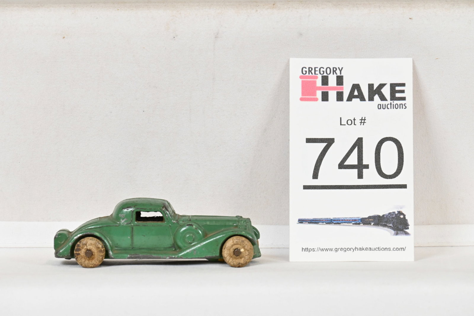 Vintage Slush Lincoln White Metal Works Green Coupe: Vintage Lincoln White Metal Works Green Sedan, C7. About 3-1/2" long.