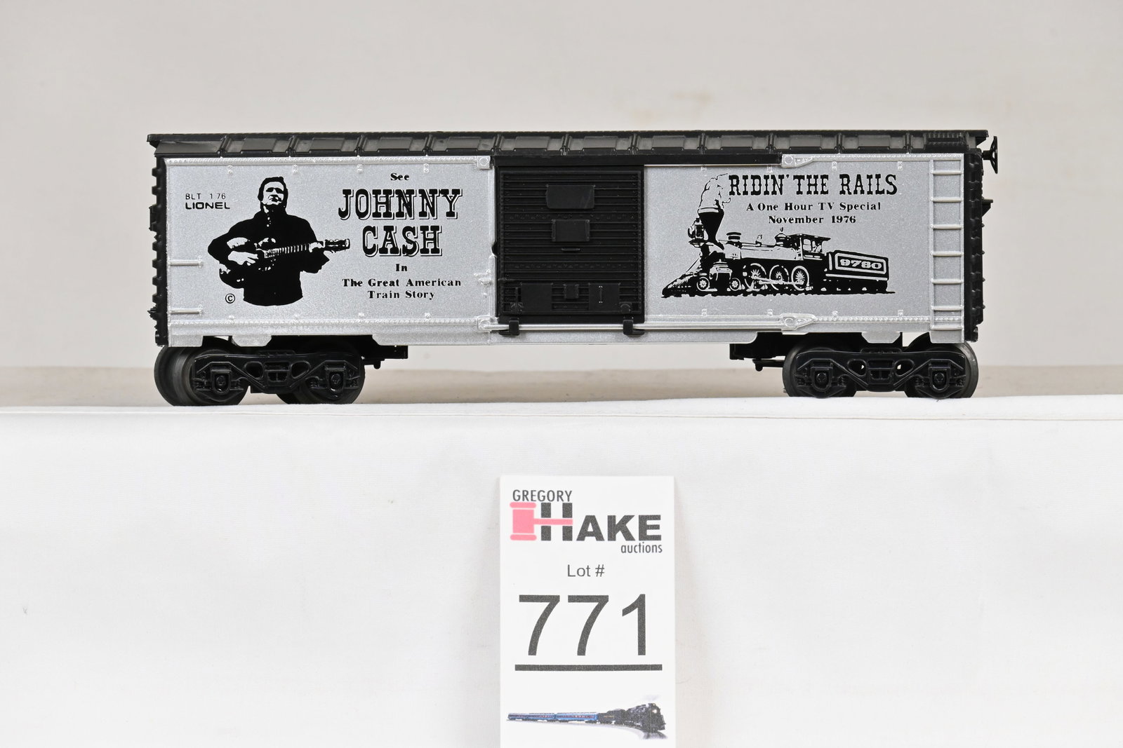 Lionel Johnny Cash Boxcar: Lionel Johnny Cash In The Great American Train Story boxcar silver painted boxcar with black lettering, door, roof and ends., C8