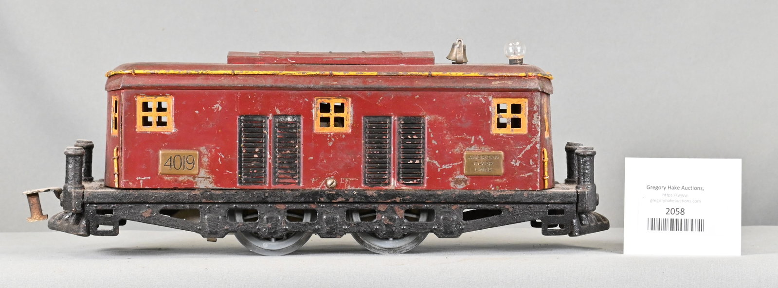 American Flyer 4019 Maroon/Red Locomotive: American Flyer 4019 Maroon/Red Locomotive with some trim missing. Wheels have been replaced. C6