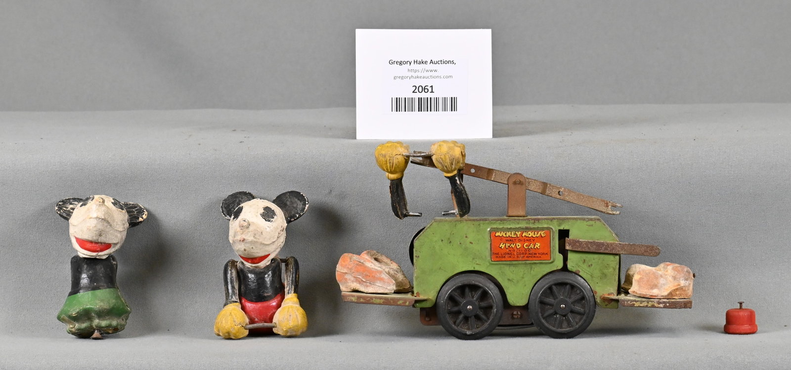 Lionel Prewar Green Base 1100 Mickey & Minnie Mouse Handcar: Lionel Prewar Green Base 1100 Mickey & Minnie Mouse Handcar. All pieces are present except the legs, C6