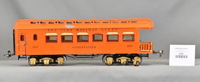 Ives Prewar Wide Gauge 182 Orange Observation Car: Ives Prewar Wide Gauge 182 Orange Observation Car. Restored to C8. Pick-up roller assembly is loose from the truck.