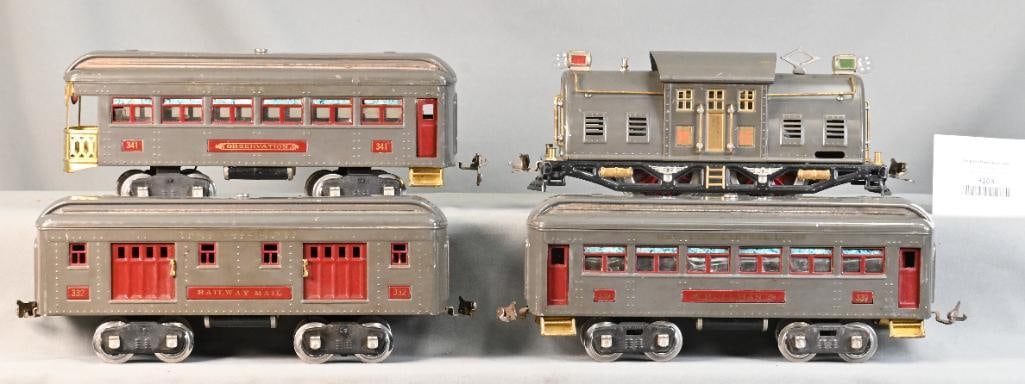 Lionel Prewar Standard Gauge Gray 10E w/332, 341 and 339 Passenger Cars: Lionel Prewar Standard Gauge Gray 10E w/332, 341 and 339 Passenger Cars. Overall C7. The 332 and 341 have some spots on the roof. The loco has been rewheeled.