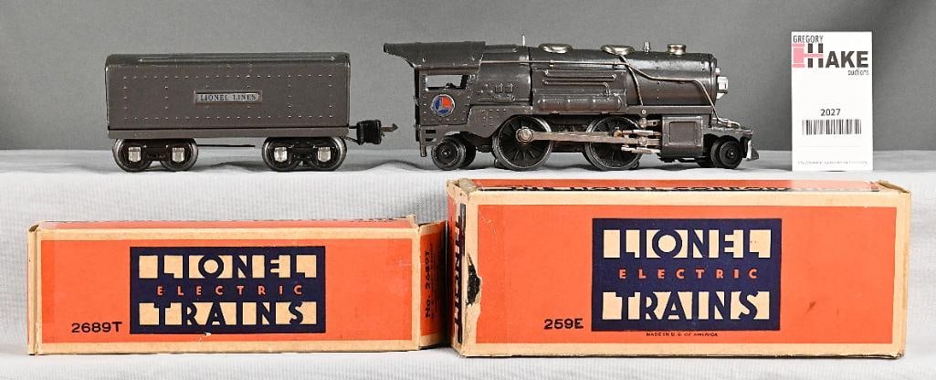 Lionel Prewar Gunmetal 259E Team Locomotive & 2689T Tender w/ Original Boxes: Lionel Prewar Gunmetal 259E Team Locomotive & 2689T Tender w/ Original Boxes. Loco and Tender are lower C7. Boxes have tape on the flaps and the 259E has its insert.