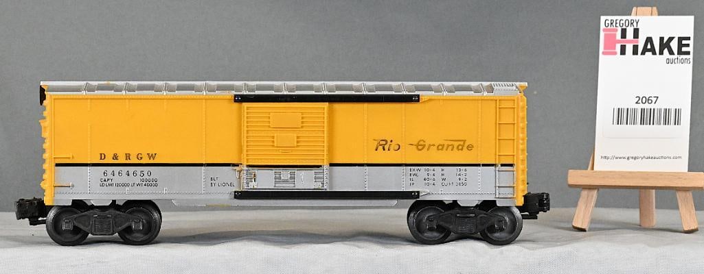 Lionel Postwar 6464-650 Rio Grande Boxcar: Lionel Postwar 6464-650 Rio Grande Boxcar. Car is unpainted yellow plastic. Needs a light cleaning.