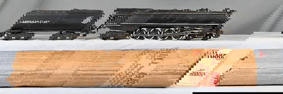 American Flyer 334 Challenger 4-8-4 Steam Locomotive w/ Tender, w/ Orig. Wrap: American Flyer 334 Challenger 4-8-4 Steam Locomotive w/ Tender, C7. Includes original wrap that has wear and clear tape. The printing is very legible.