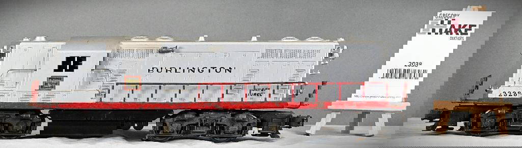 Lionel Postwar 2328 Burlington GP-7 Diesel Locomotive.: Lionel Postwar 2328 Burlington GP-7 Diesel Locomotive, lower C7. Needs to be cleaned. Size 12x6x4
