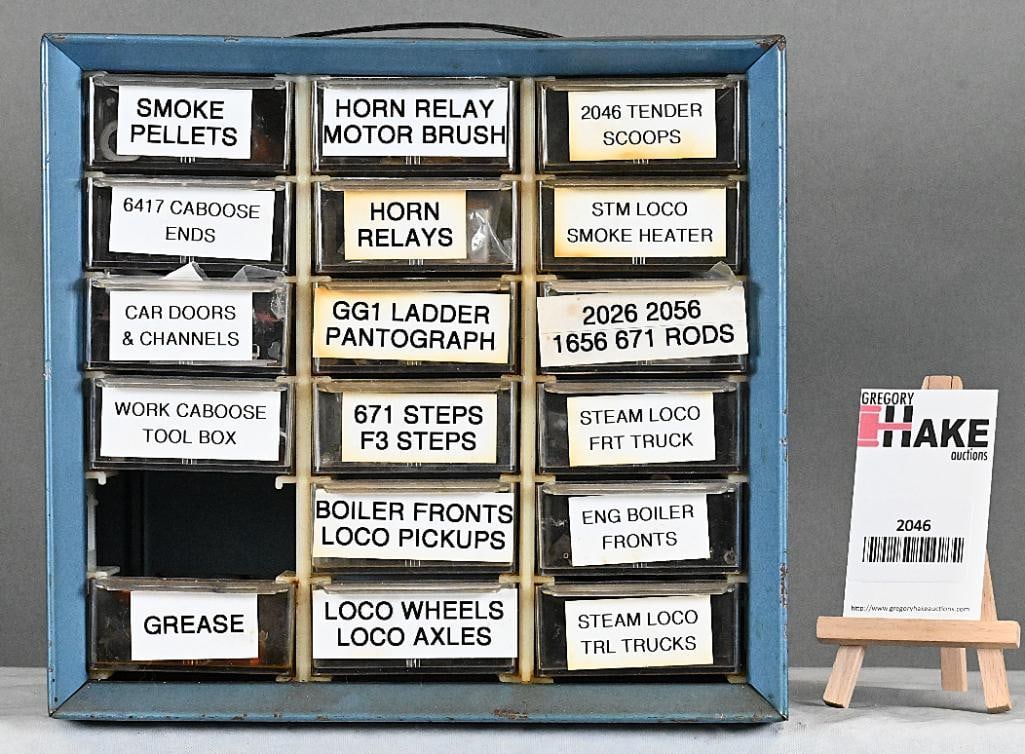 Parts Cabinet of Lionel Postwar Parts: Parts Cabinet of Lionel Postwar Parts - Smoke Pellets, Side Rods, Boiler Fronts, Car Doors and Channels, Horn Relays and More, C6/8 & More, C6-C8. Size 12x6x10
