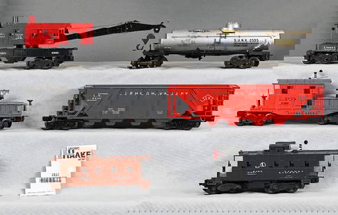 Group of 5 Lionel Postwar Freight Cars - 2420, 6457, 6560, 2555 and 6436-110: Group of 5 Lionel Postwar Freight Cars - 2420, 6457, 6560, 2555 and 6436-110, C7. Size 14x6x6
