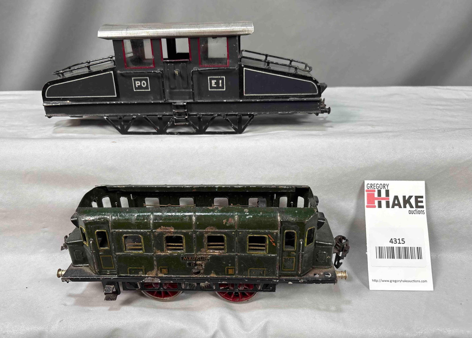 Two Prewar European Locomotives: Two Prewar European Locomotives. Electric locomotive marked Marklin is missing roof; Other locomotive is shell only - missing motor and roof. Marklin C6; other C7.