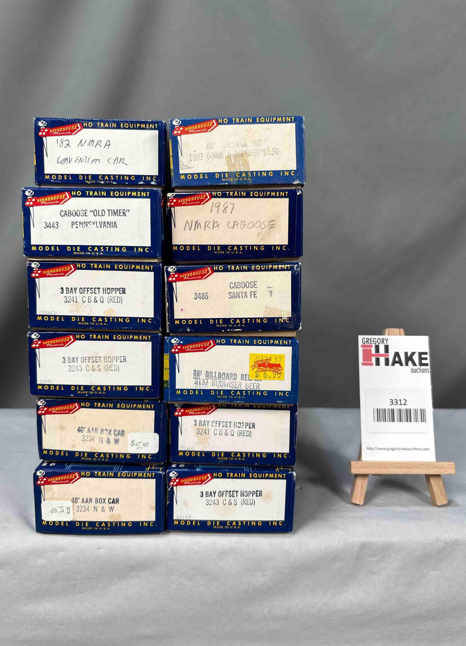Group of 12 Roundhouse Trains: Group of 12 assorted Roundhouse trains w/boxes. See photos for details. Size 8x10x6