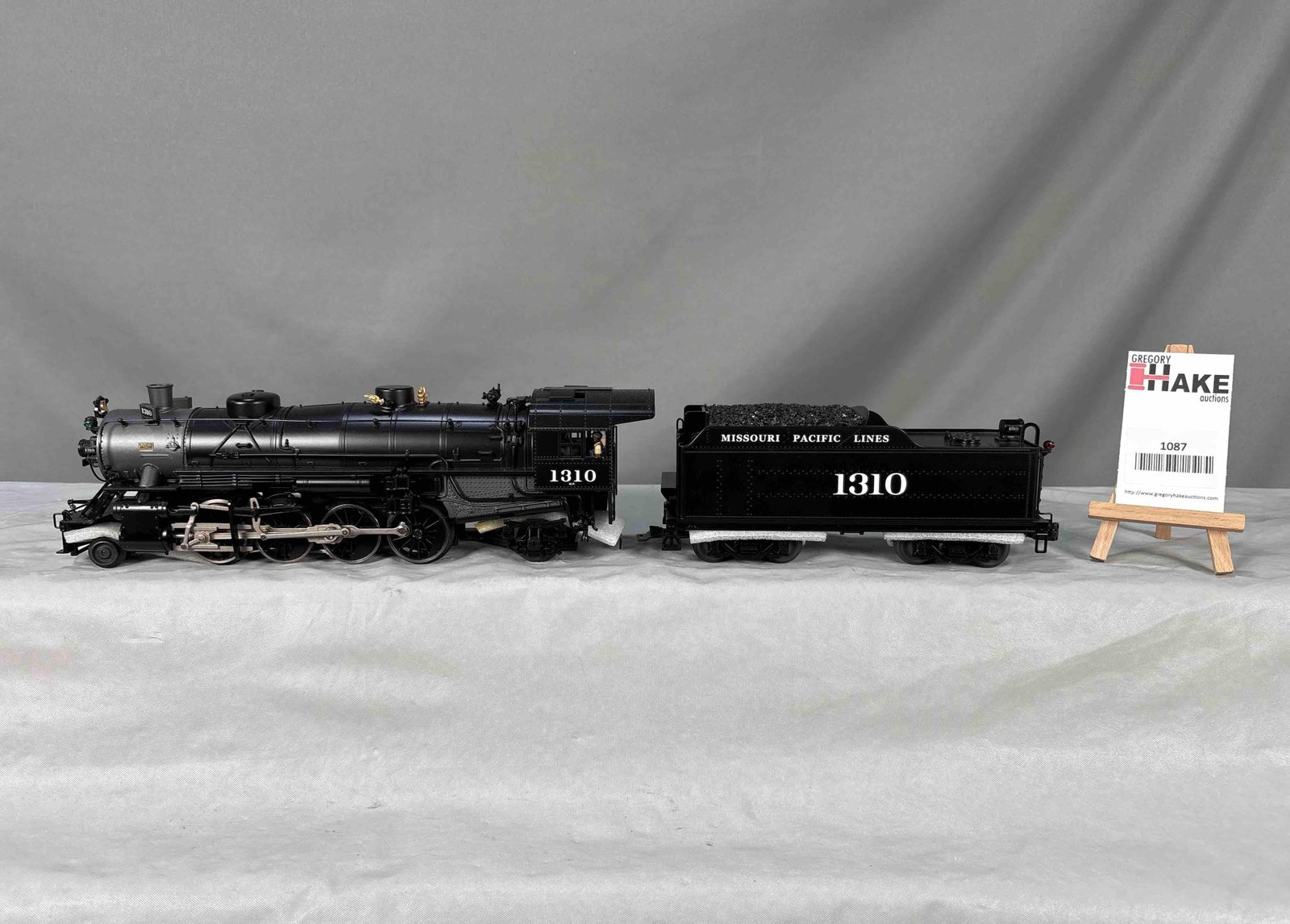 Lionel MoPac Legacy Mikado Locomotive and tender: HTF Lionel Missouri Pacific 2-8-2 Mikado Steam Locomotive and tender.#1310 in Satin Black livery. C9 with OB and factory shipper SKU 6-11284