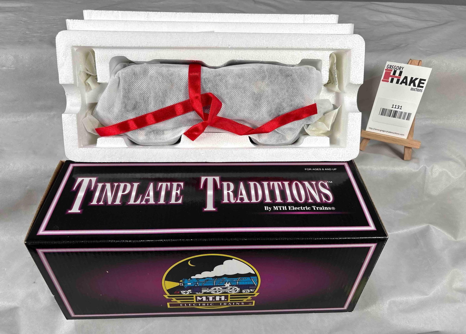 MTH 2816 Coal hopper: MTH Tinplate traditions 2816 coal hoppers in Bright red with black with brass trim livery. with black coal load C10 condition with OB SKU 10-8008