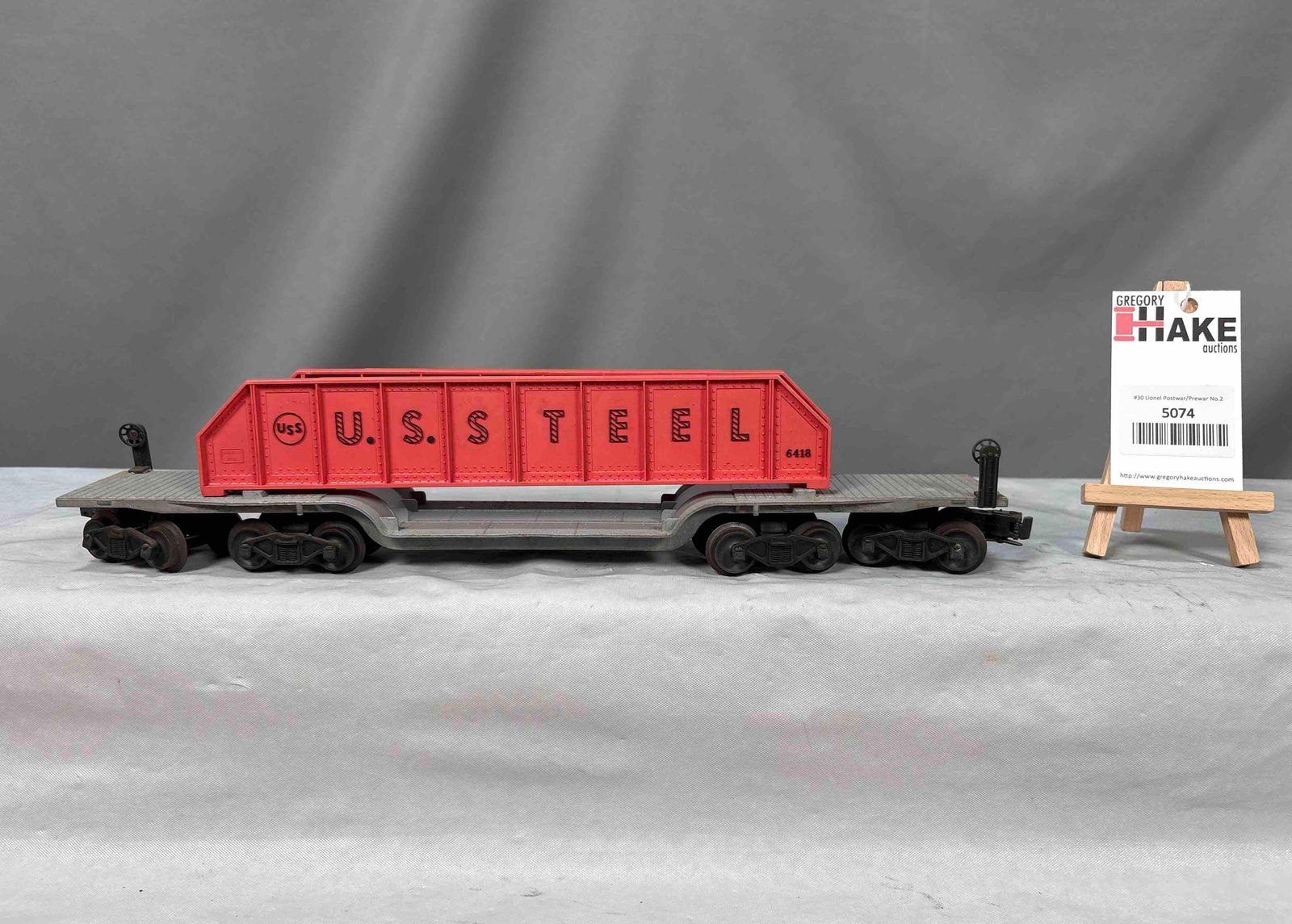 Lionel Postwar 6418 Depressed Center Car w/ Salmon Pink Bridge Girders: Lionel Postwar 6418 Depressed Center Car w/ Salmon Pink Bridge Girders, needs to be cleaned - C7. Size 16x3x4