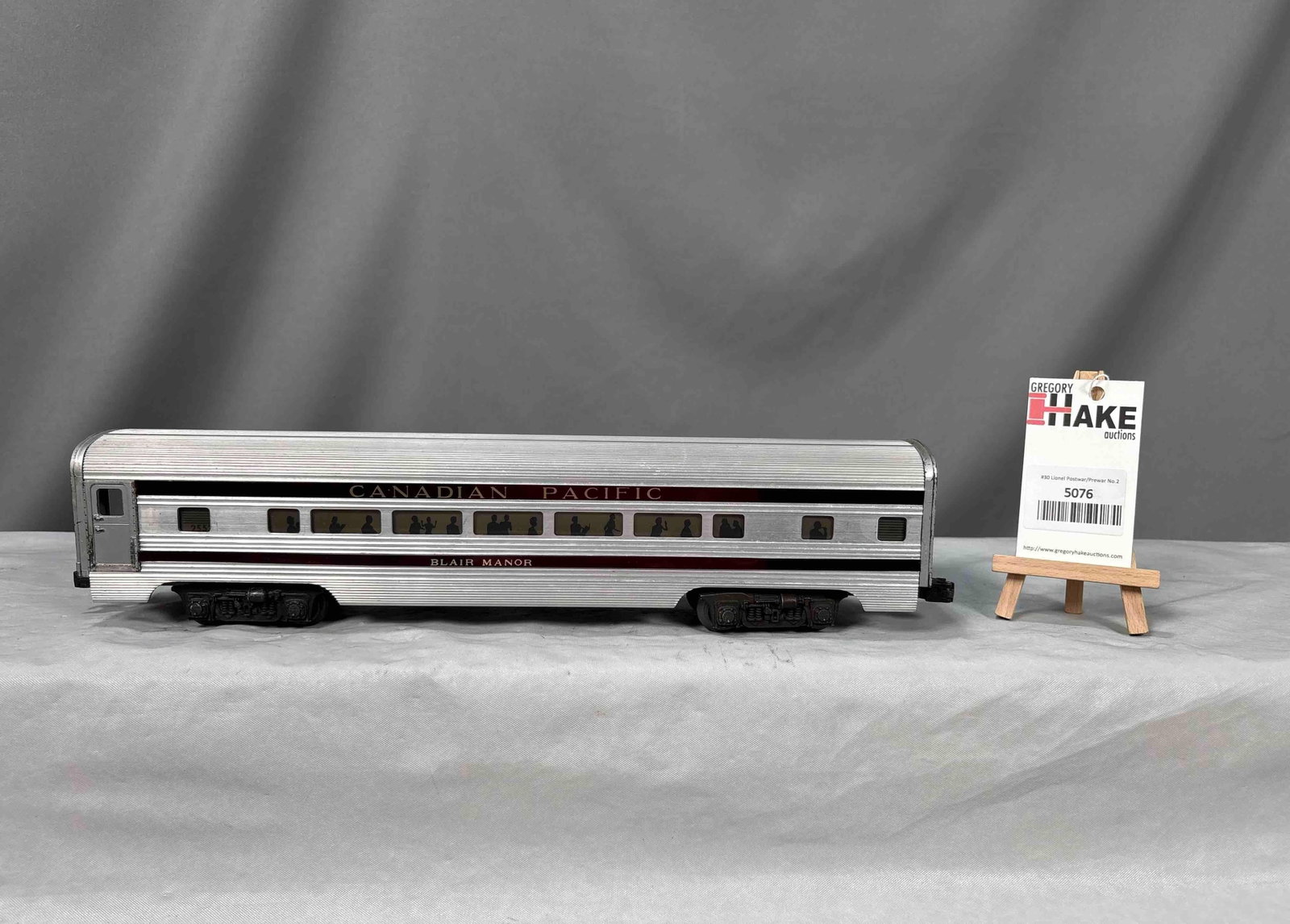 Lionel Postwar 2553 Blair Manor Canadian Pacific Pullman Passenger Car: Lionel Postwar 2553 Blair Manor Canadian Pacific Pullman Passenger Car, C7. Some of the stripes are aftermarket. Size 17x3x4