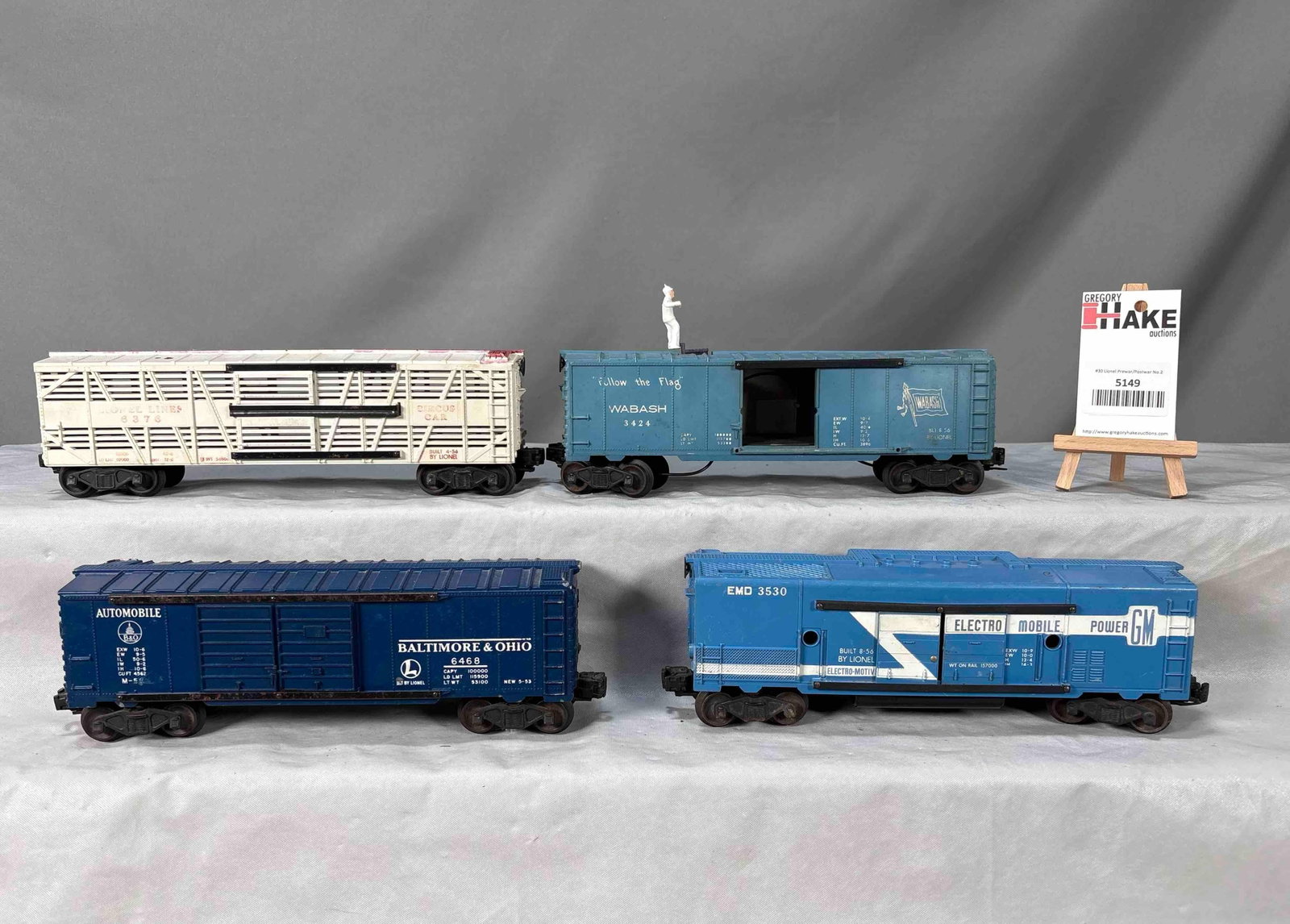 4 Lionel Postwar Freight Cars: 4 Lionel Postwar Freight Cars, C6. Cars are offered AS IS WITH NO RETURNS. See Photos for details. Size 12x12x4