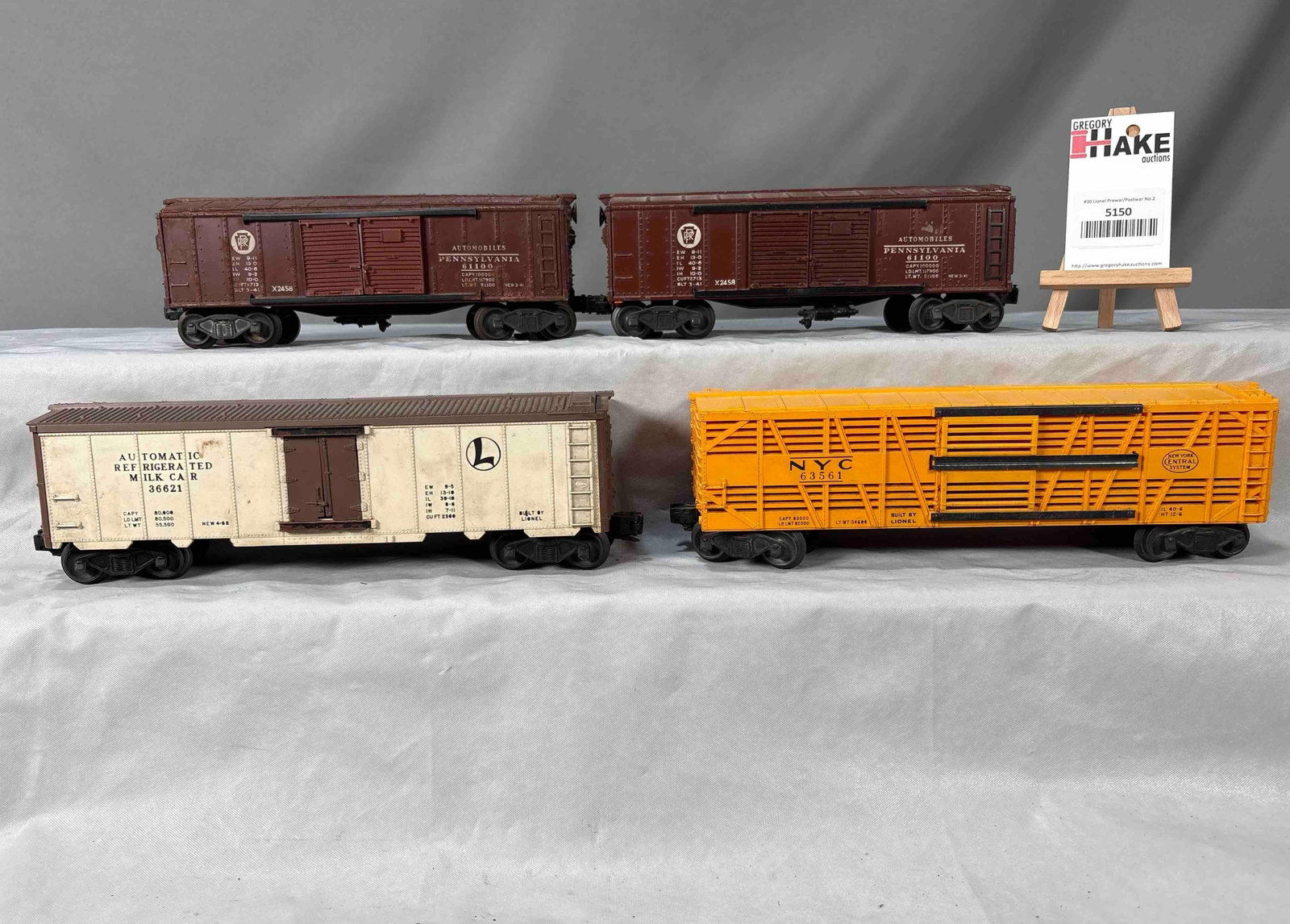 4 Lionel Postwar Freight Cars: 4 Lionel Postwar Freight Cars, C6. Cars are offered AS IS WITH NO RETURNS. See Photos for details. Size 12x12x4