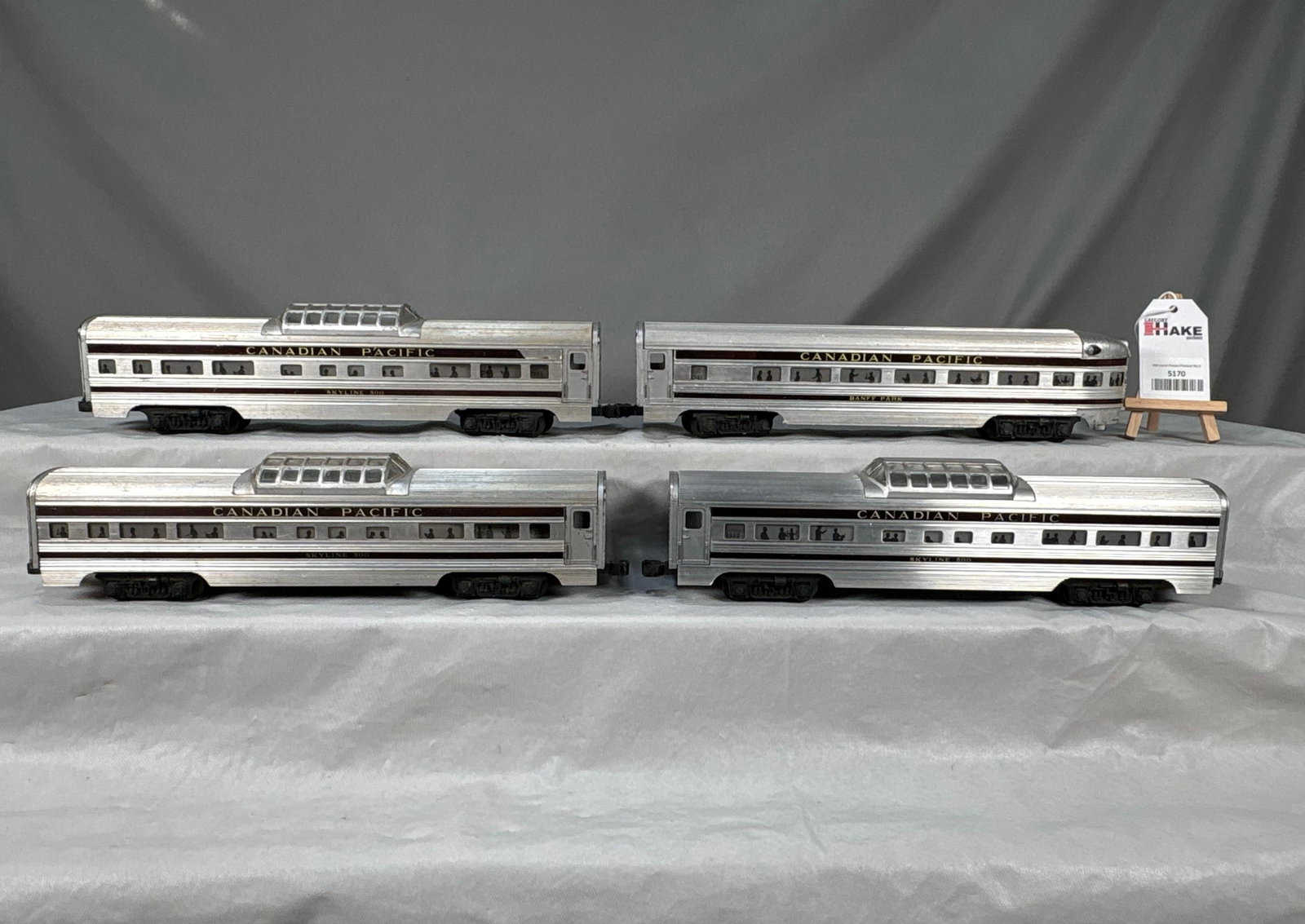 4 Lionel Postwar Canadian Pacific Passenger Cars: 4 Lionel Postwar Canadian Pacific Passenger Cars. Some cars have replaced stripes otherwise, C6/C7. Size 17x12x4