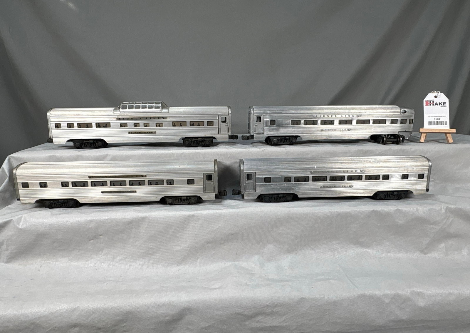 4 Lionel Postwar Extruded Aluminum Passenger Cars: 4 Lionel Postwar Extruded Aluminum Passenger Cars. Lower C7. Size 17x12x4