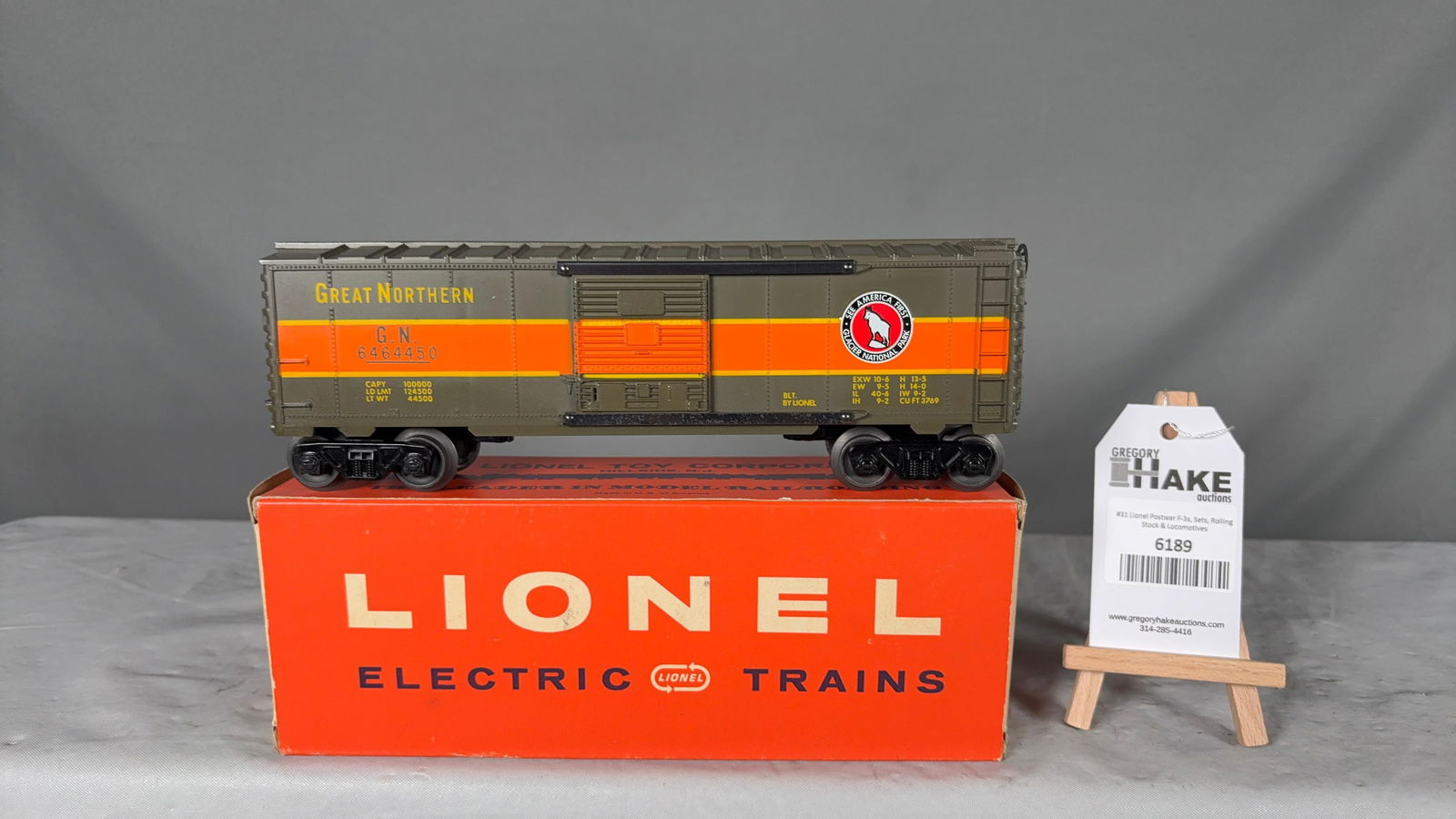 Lionel Postwar 6464-450 Great Northern Boxcar w/OB: Lionel Postwar 6464-450 Great Northern Boxcar w/OB, C8. Original box is square with nice color, but window has been torn.