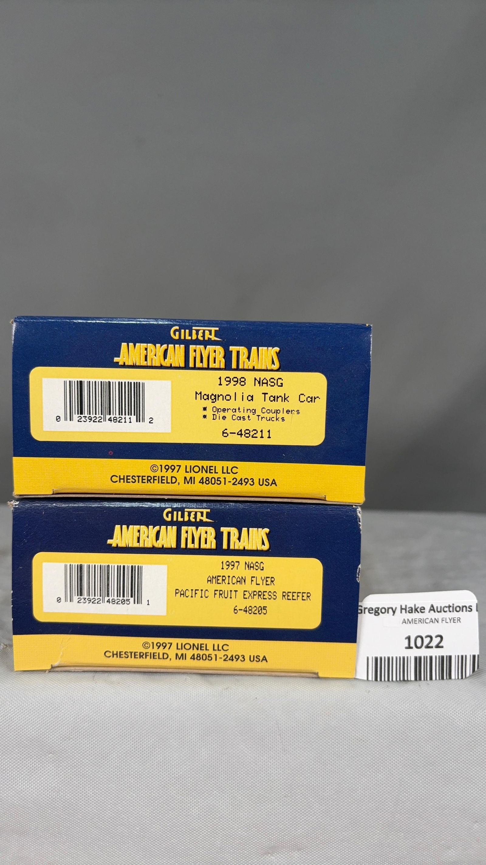 Includes 48211 1998 NASG Magnolia Tank Car and 48205 1997 NASG Pacific Fruit Express Boxcar w/obs - 2